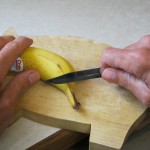 Cutting the stem with a knife.  (Even using a cutting board!)